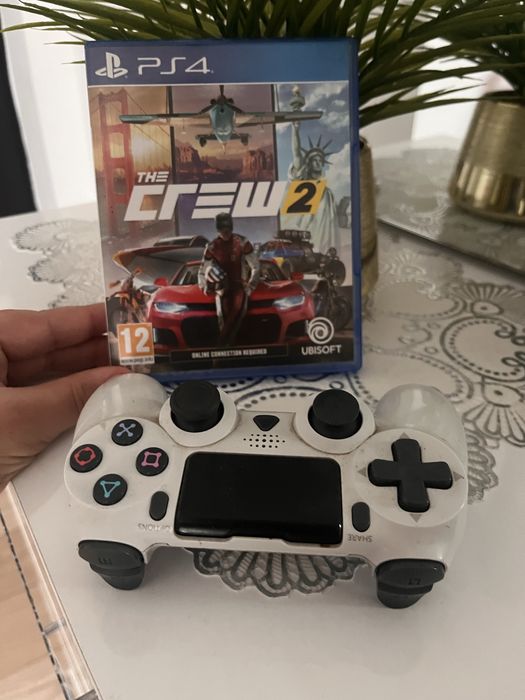 PlayStation 4 functionabil + 5jocuri +3console + volan original 360grd