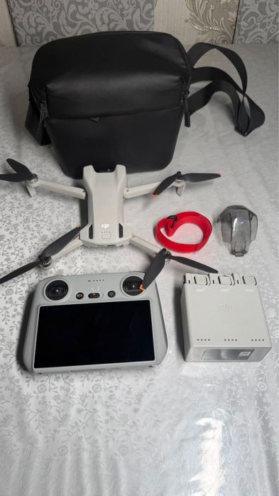 DJI Mini 3 — дрон с пультом и аккумулятором