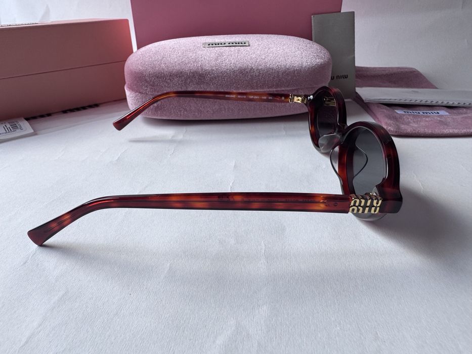 Ochelari de soare Miu Miu Oval SMU04Z 50-18 140, Noi