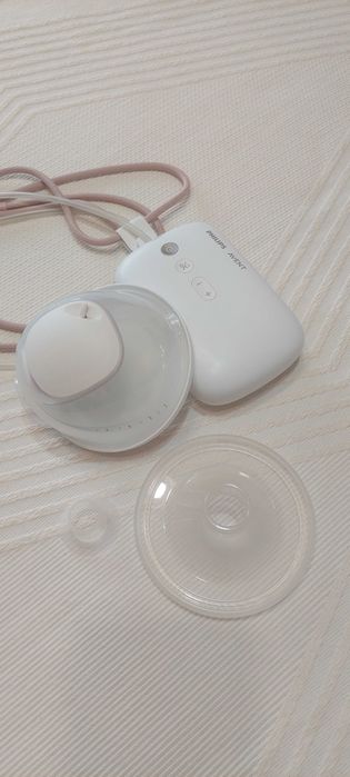 Помпа за кърма и столче за новородено