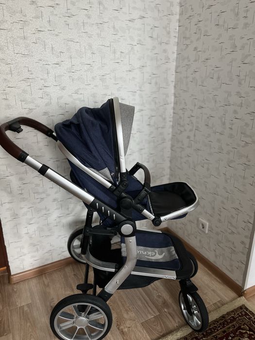 Коляска с автолюлкой