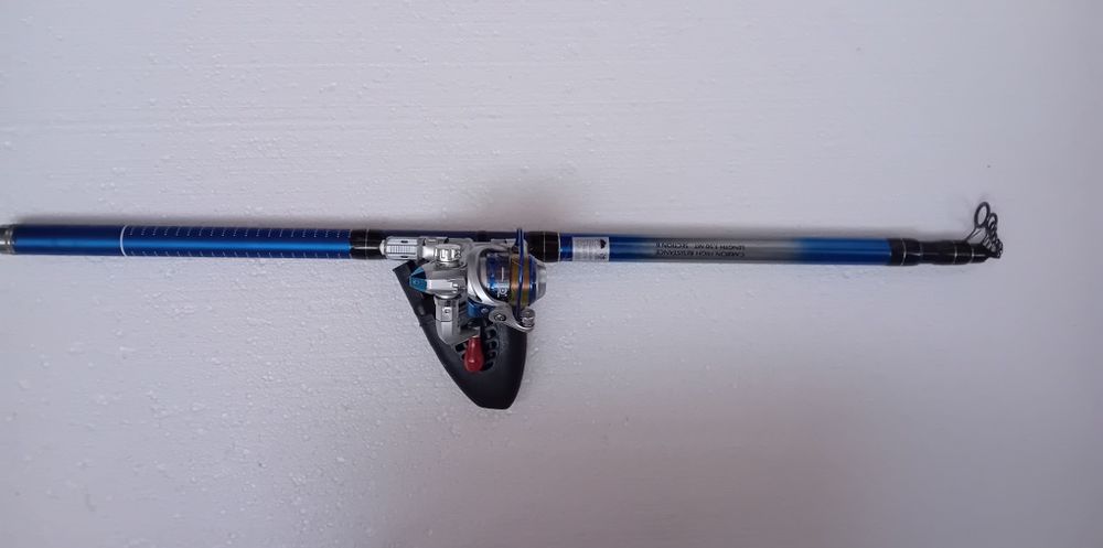 Пръчка за перо с малка макара