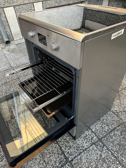 Свободностояща електрическа печка с индукционен плот KOENIC KFC 2311 A