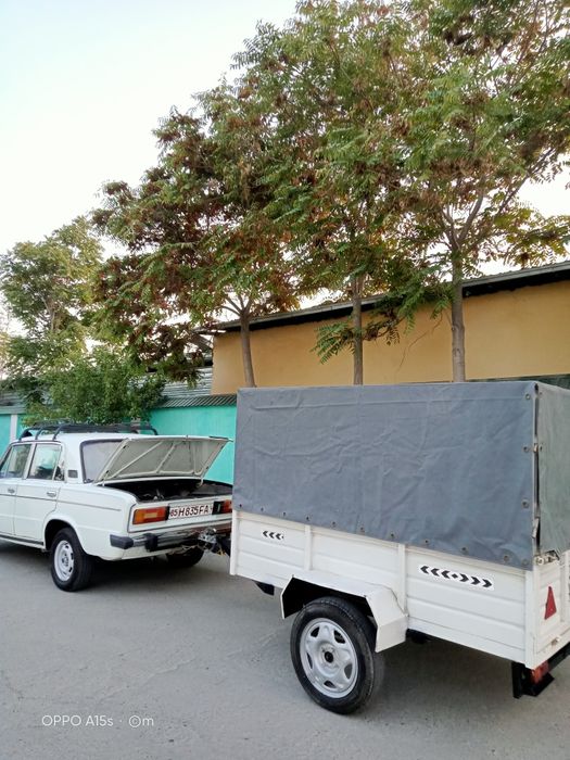 Лада ваз 2106 с прицепом.