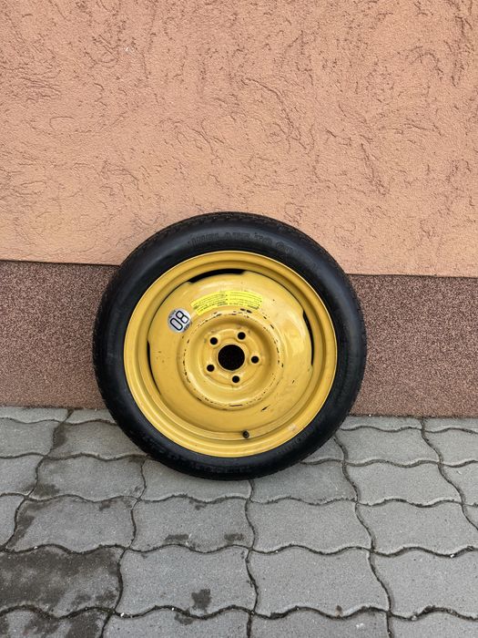 * Nouă* Roată de rezervă T135/70D16