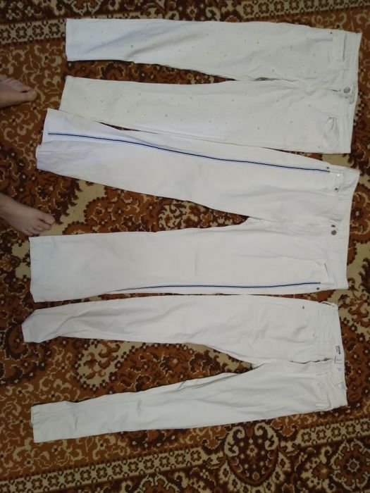 Продаются белые брюки р.48