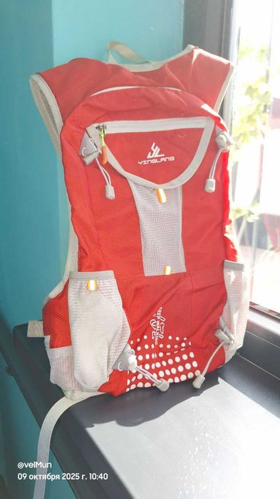 Продам новый велорюкзак красного цвета