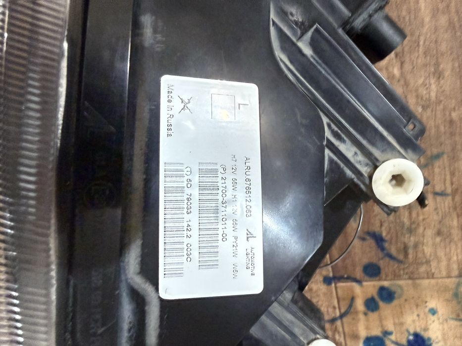 Фара приора 1 левая оригинал бош