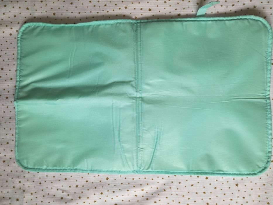 Подложка за преобуване на бебе