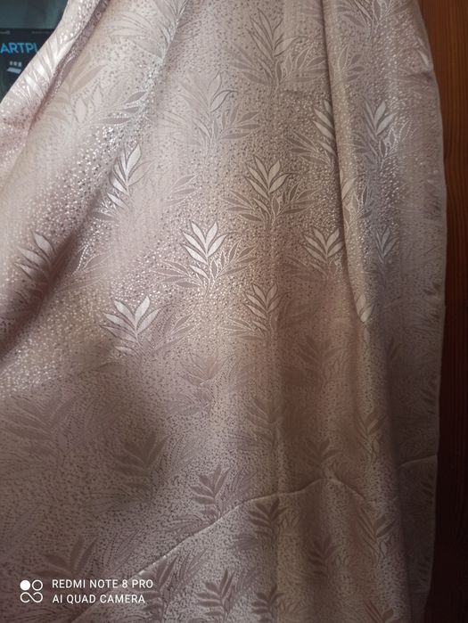 Продам шторы коричневые.