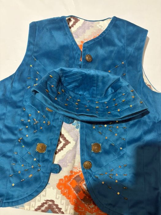 Детская жилетка