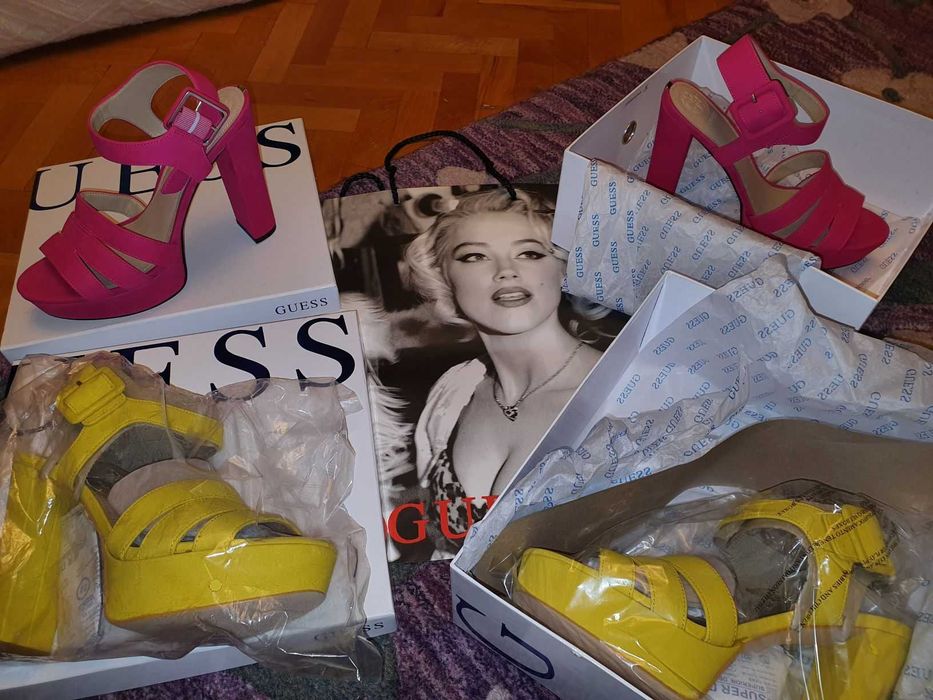 Sandale cu toc pentru femei marca Guess , din piele naturala .