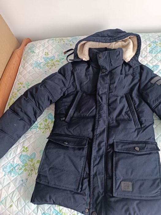 Продам куртки жилетки