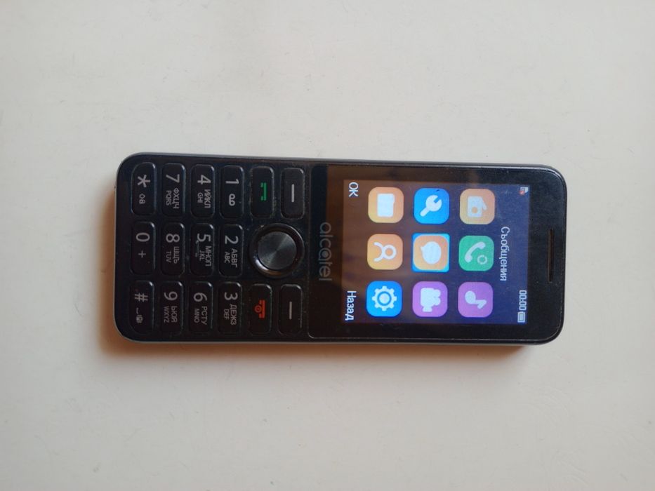 Телефон с копчета / бутони Alcatel и зарядно