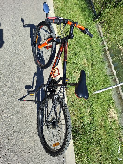Vand bicicleta B-twin rockrider 500 pret 550 lei