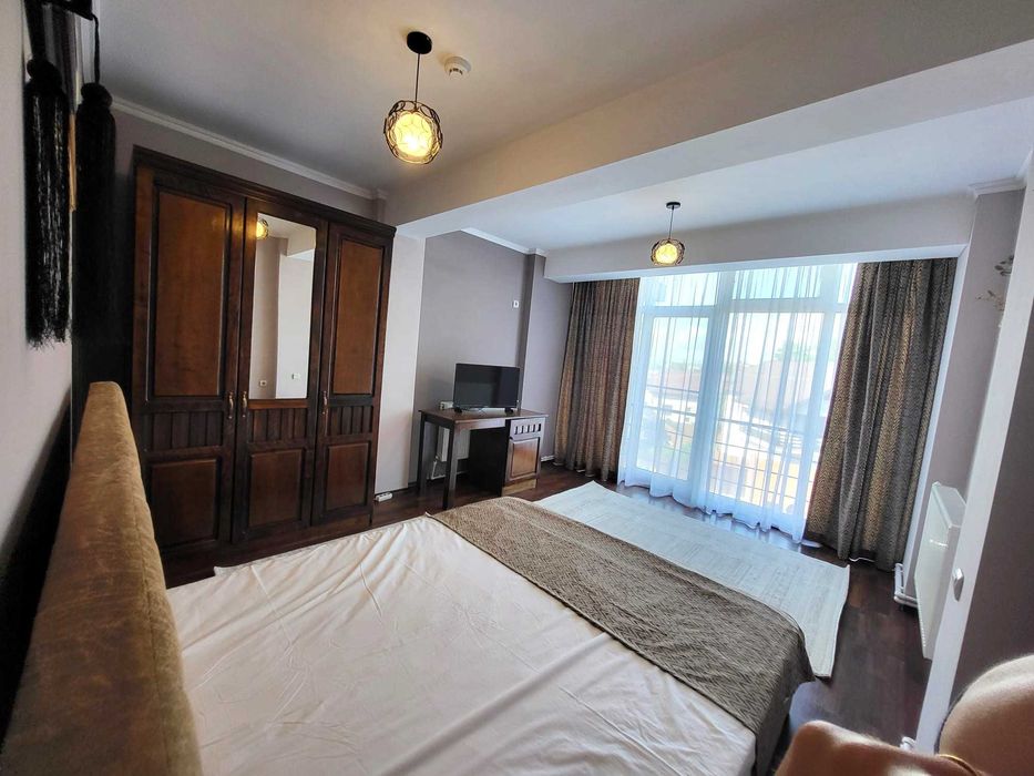 Apartament 2 cam living+bucatarie open space, 1 balcon, 1 baie, dressing, loc parcare, OMW Bucium 68mp