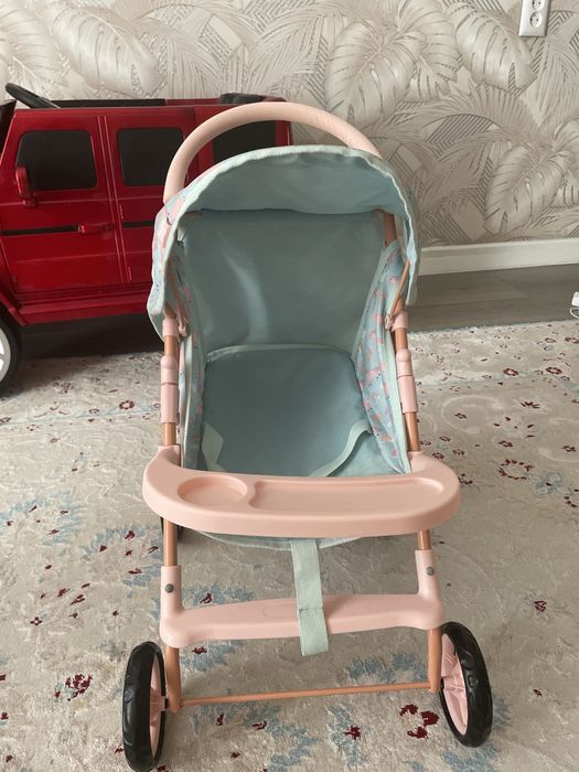 Прогулячная коляска для кукол