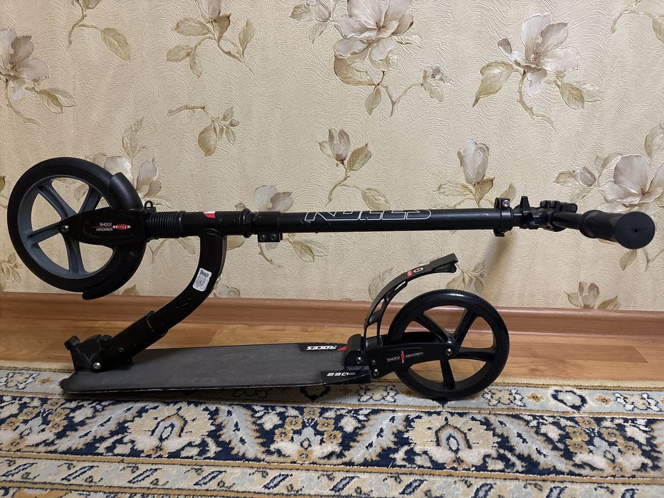 Продам самокат ROCES 230