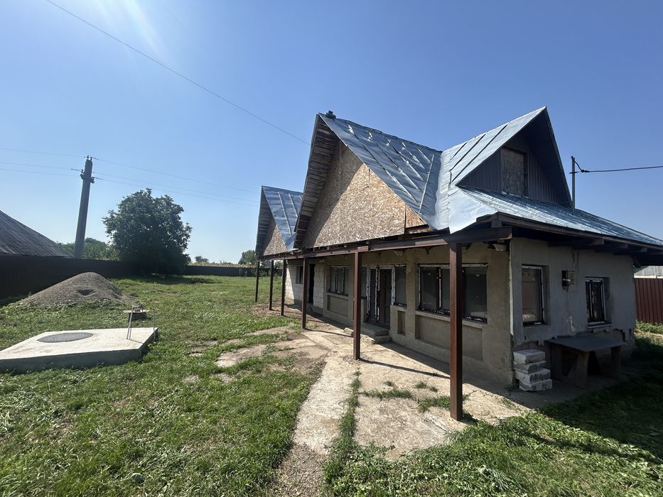 Vând casă și teren Dochia