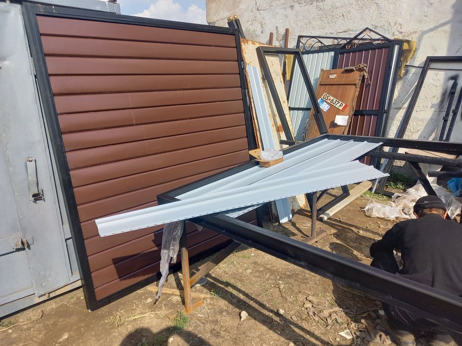 Заборы ворота из проф листа и сайдинга