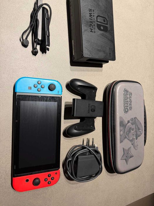 Nintendo Switch + аксесоари + игри + 256 GB памет