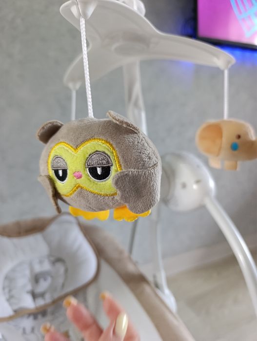 Электрическая детская качеля