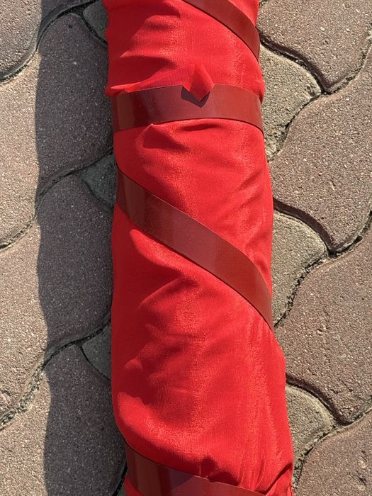 Продам красную ткань рулон