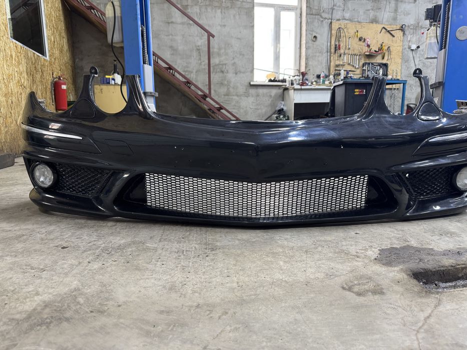 Передный бампер W211