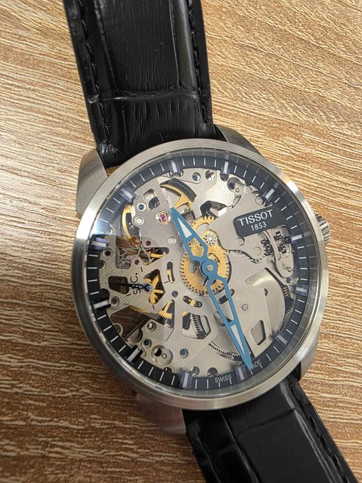 Часовник TISSOT SKELETON  T070405A