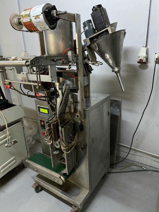 Masina de ambalat produse granulate
