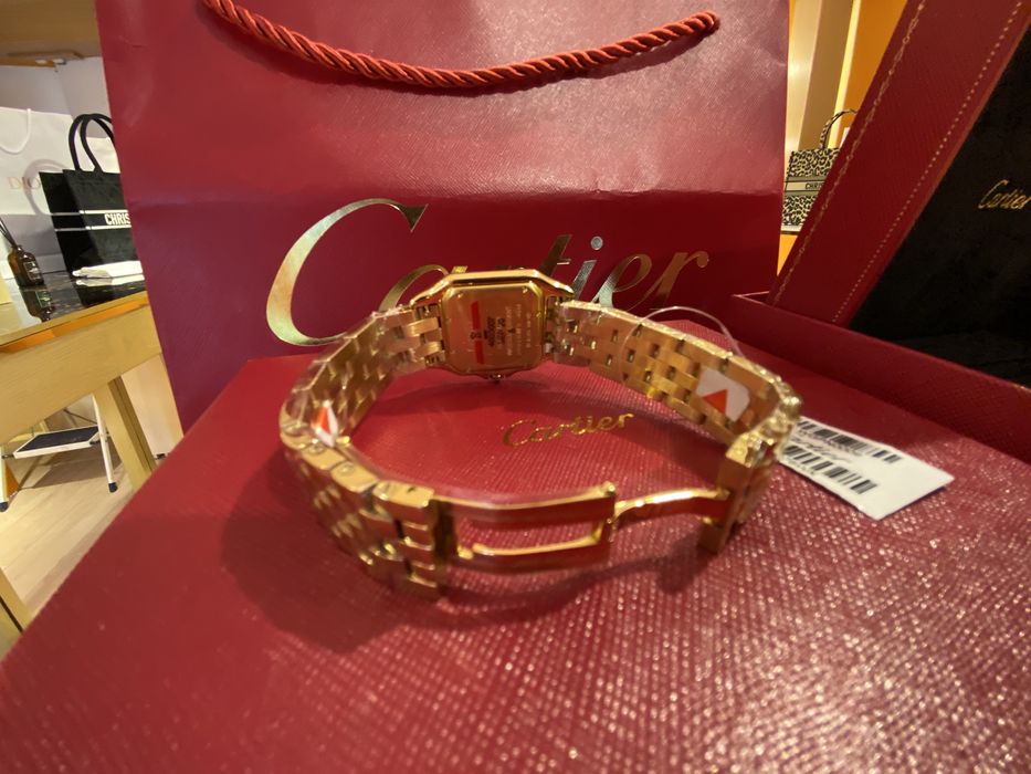 Женские часы Cartier
