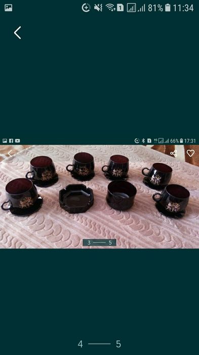 Чайный сервиз из темного стекла.