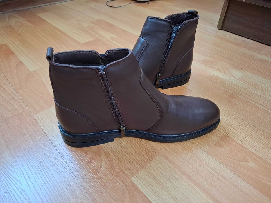 Продам новые сапоги мужские