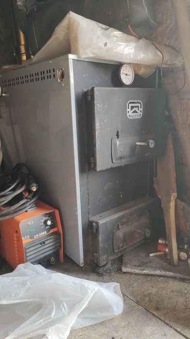 Котел Теплодар 16кв с дымоходом.