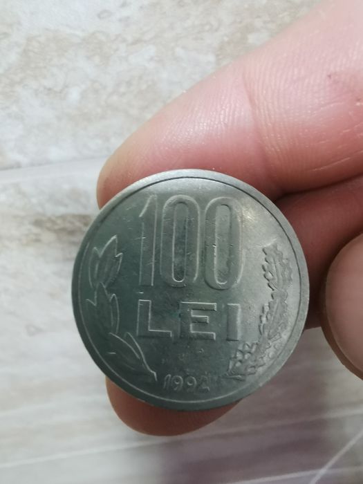 Vand monedă 100 lei