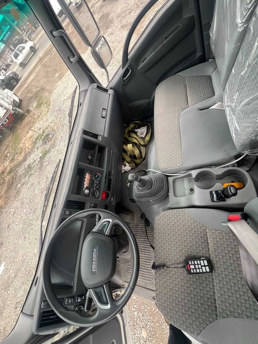ISUZU ELF KV100 Эвакуатор