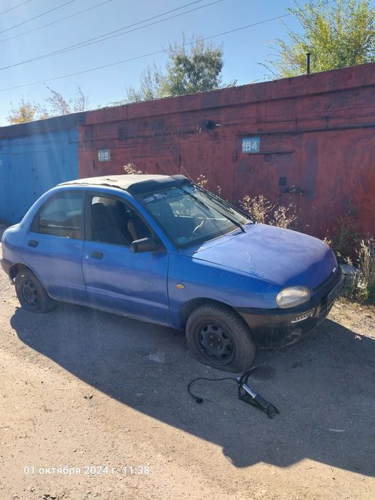 Мазда 121 в сборке на запчасти
