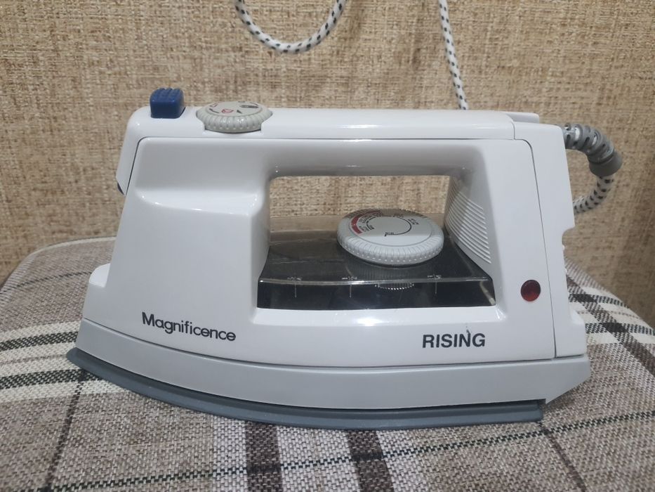 Утюг новый rising