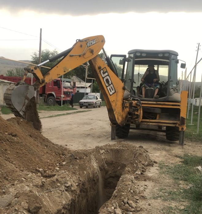 Трактор три в одном, Экскаватор погрузчик,