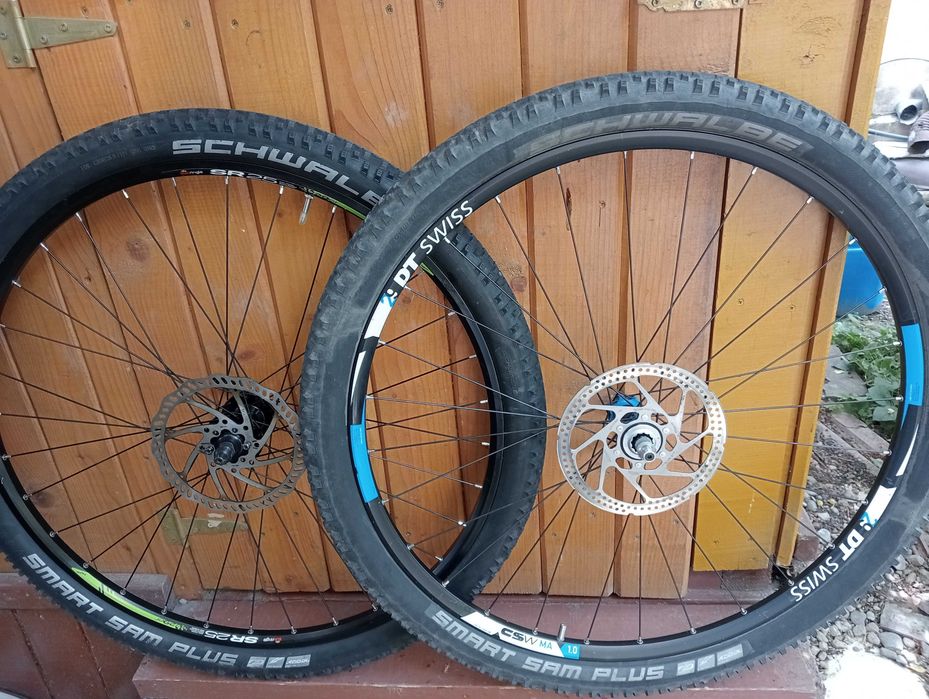 Set roti 28 frana disc Shimano Deore   Roti fata 29 DT Swiss complete