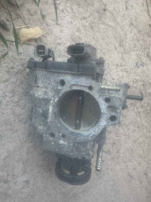 Дроссельная заслонка