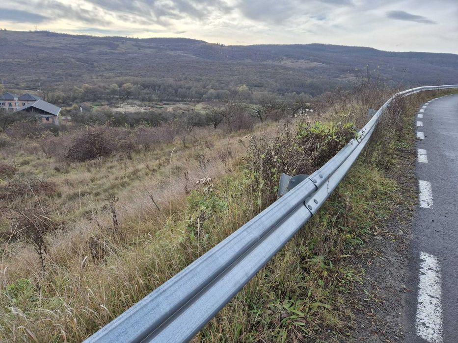 teren INTRAVILAN  9 880 mp, front 63m BACIU, pt 16 case