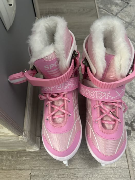 Продаю коньки розовые.