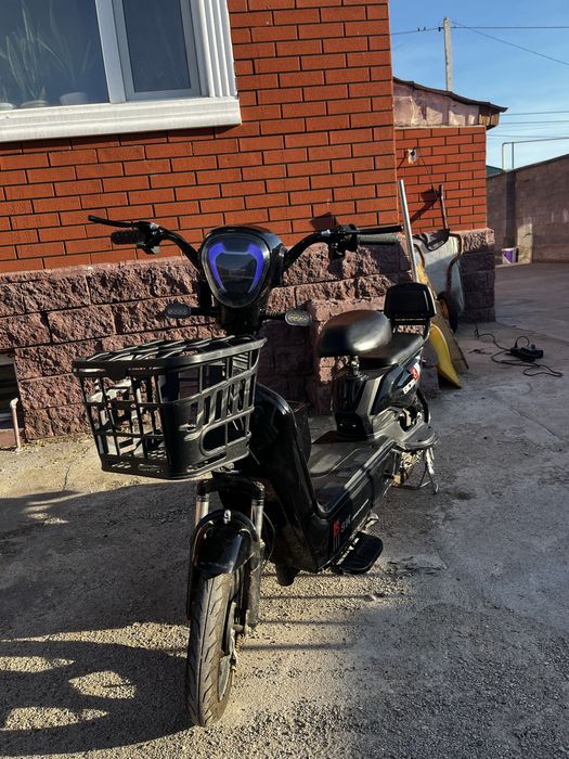 Электроный скутер