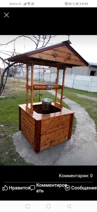 Колодец из натурального дерева.