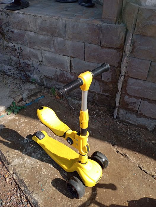 Детский самокат с сиденьем