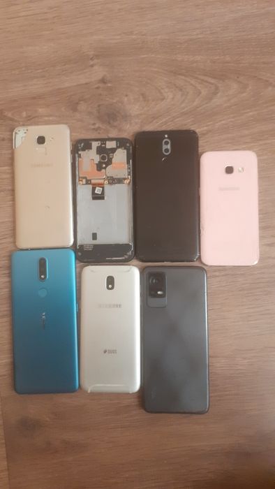 Телефони за части