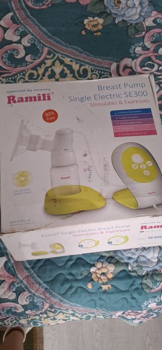 Электрический молокоотсос