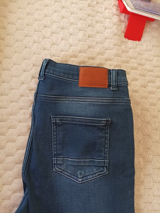 Джинсы на подростка 13-14 лет .