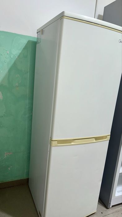 Холодильник в рабочем состояние